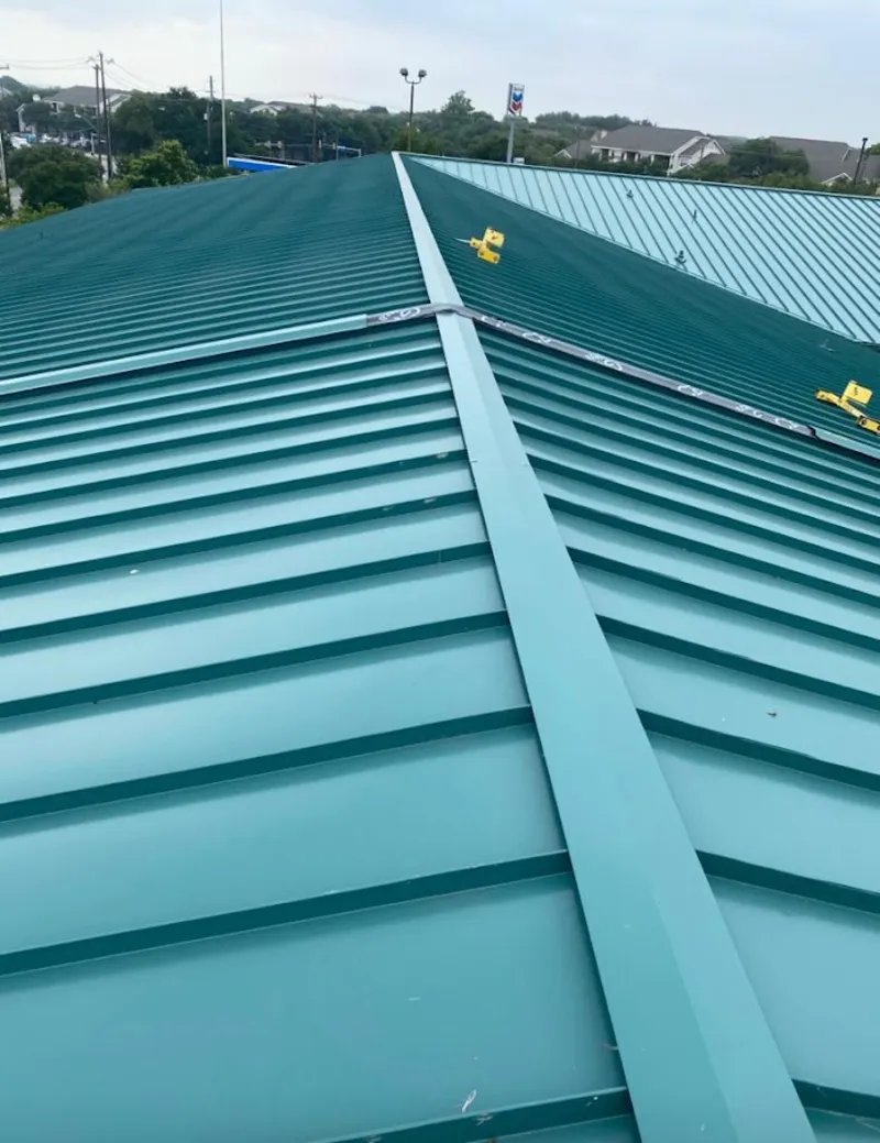 Green commercial metal roof ridge and valley for Metal Roof Repair in Creve Coeur