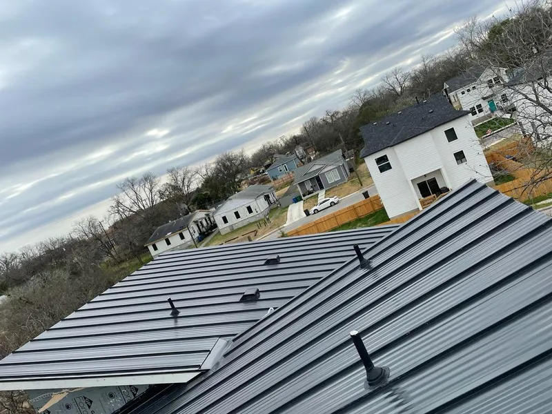 Standing seam metal roof panels with vents for Skylight Repair in Creve Coeur